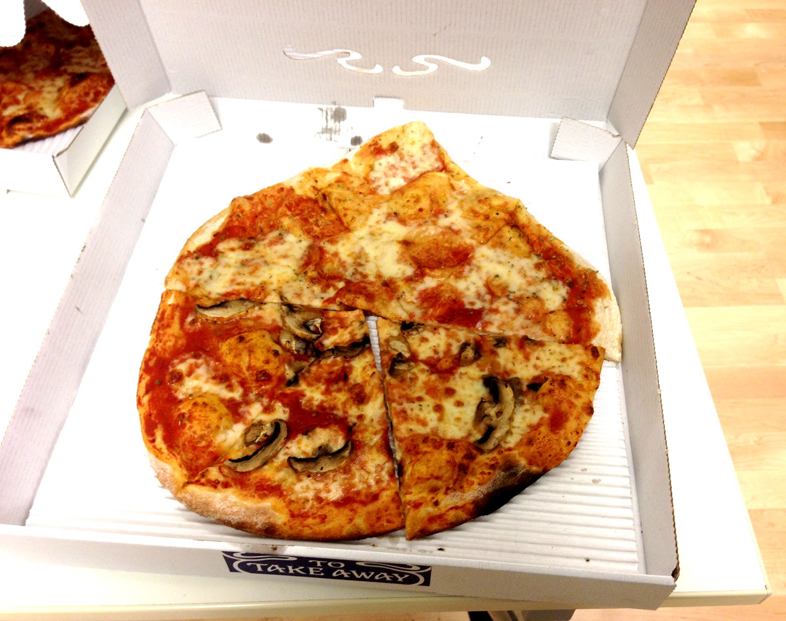 Drupal logo shaped pizza